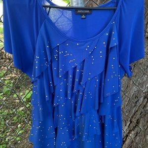 Royal ruffled blouse with gold dots.